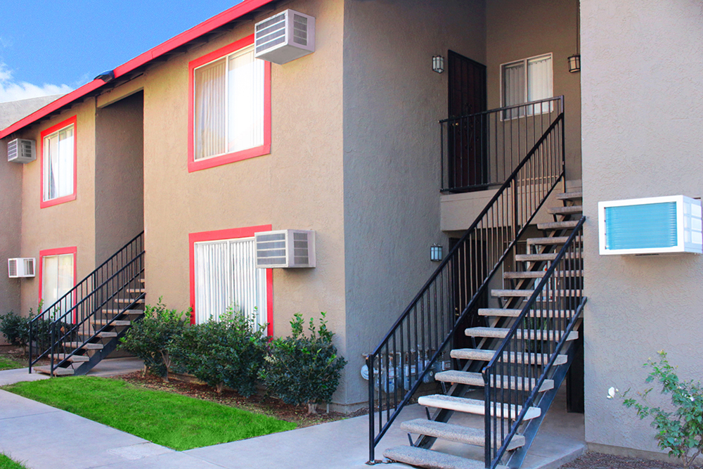 This image displays two-story building photo in Sterling Estates Apartments.